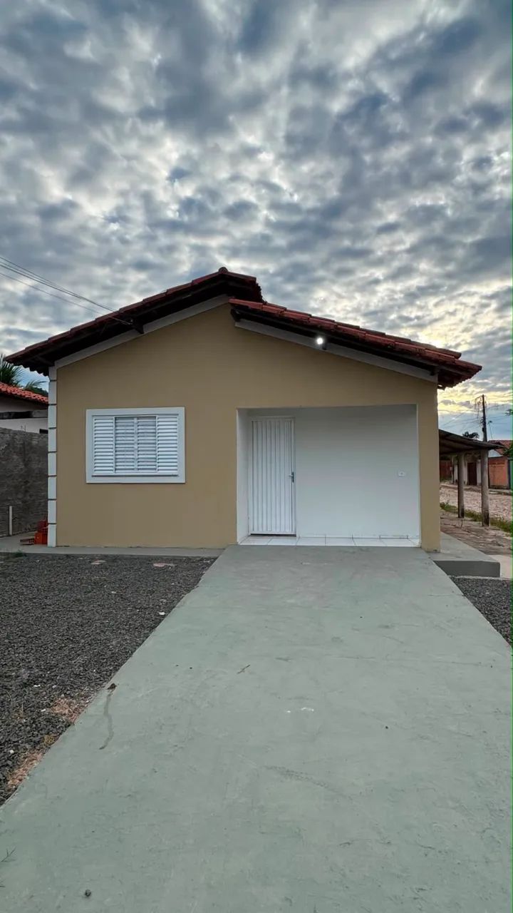 CASA EM ALTOS COM PONTO COMERCIAL
