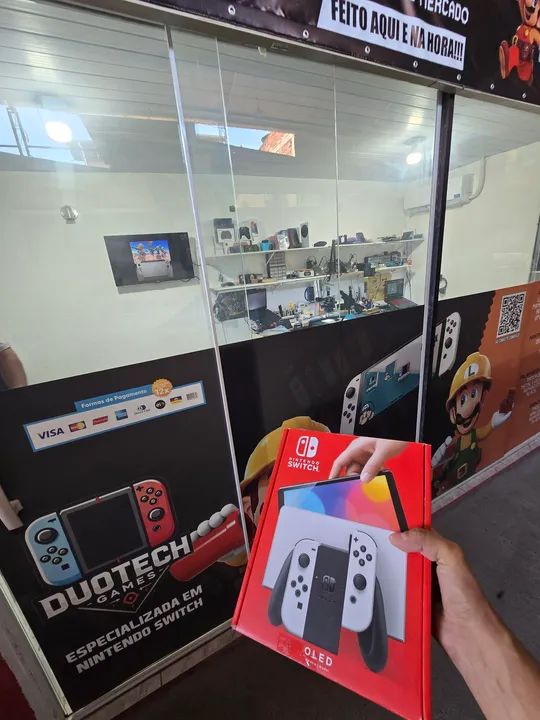 Nintendo Switch OLED Novo Desbloqueado Com brinde - Foto 2