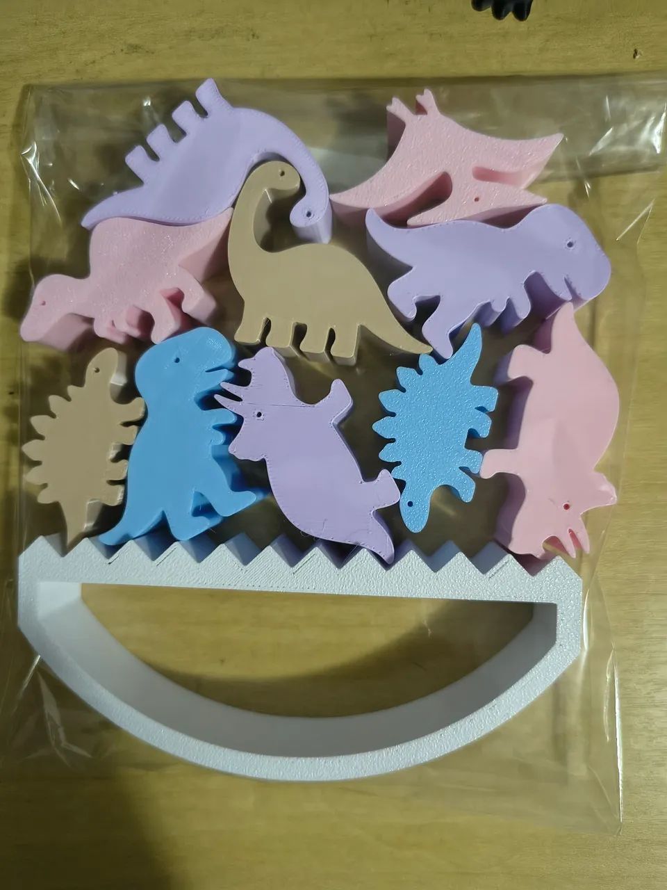 Jogo malabarista dinossauro
