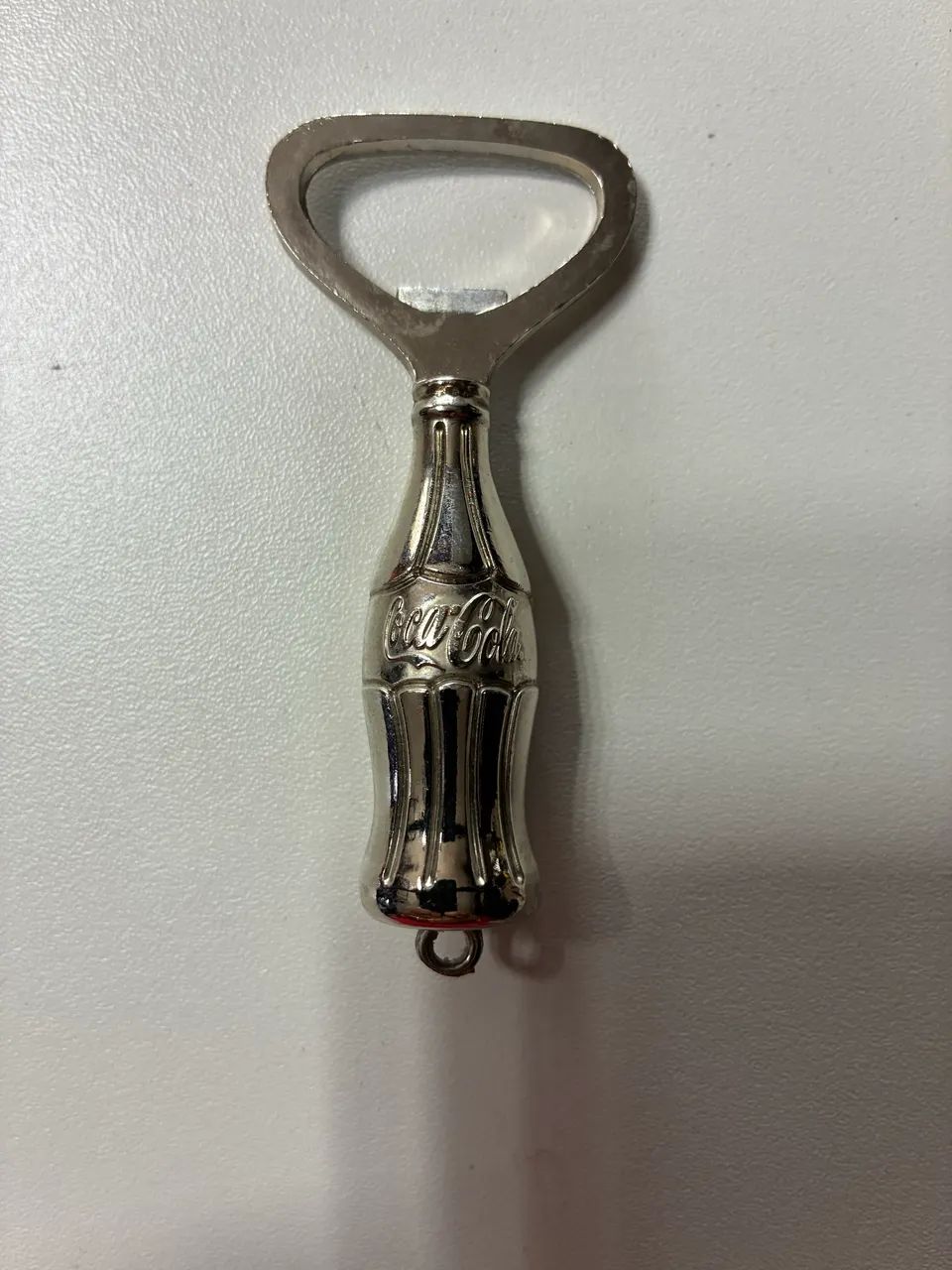 Abridor metal cromado COCA COLA 