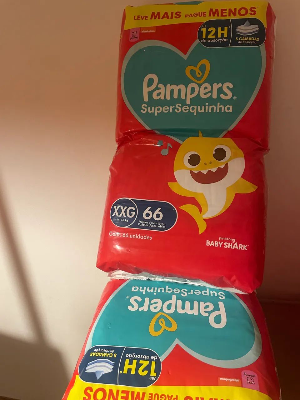 Fralda Pampers  xxg , 80$ casa pacote .