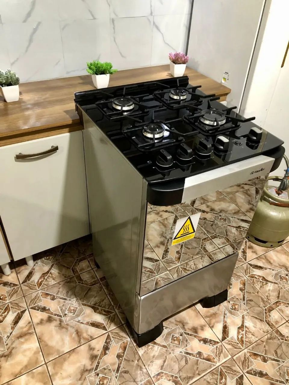 VENDO FOGÃO MODELO MUELLER MESA DE VIDRO ESPELHADO 04 BOCAS  - Foto 6