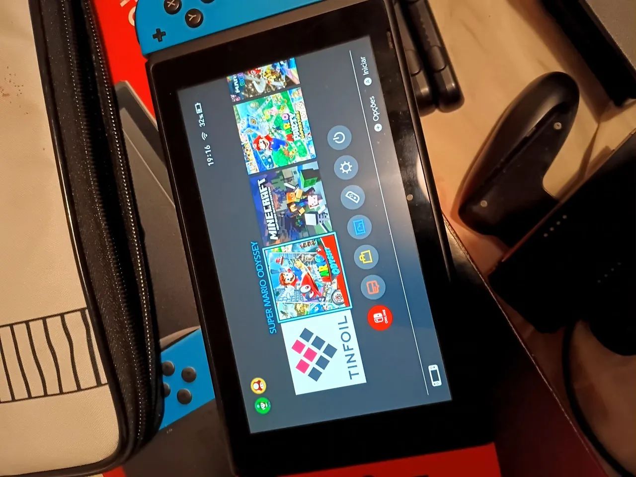 Nintendo Switch V2 Desbloqueado TROCO POR PS4 BEM CONSERVADO COM JOGOS ETC - Foto 2