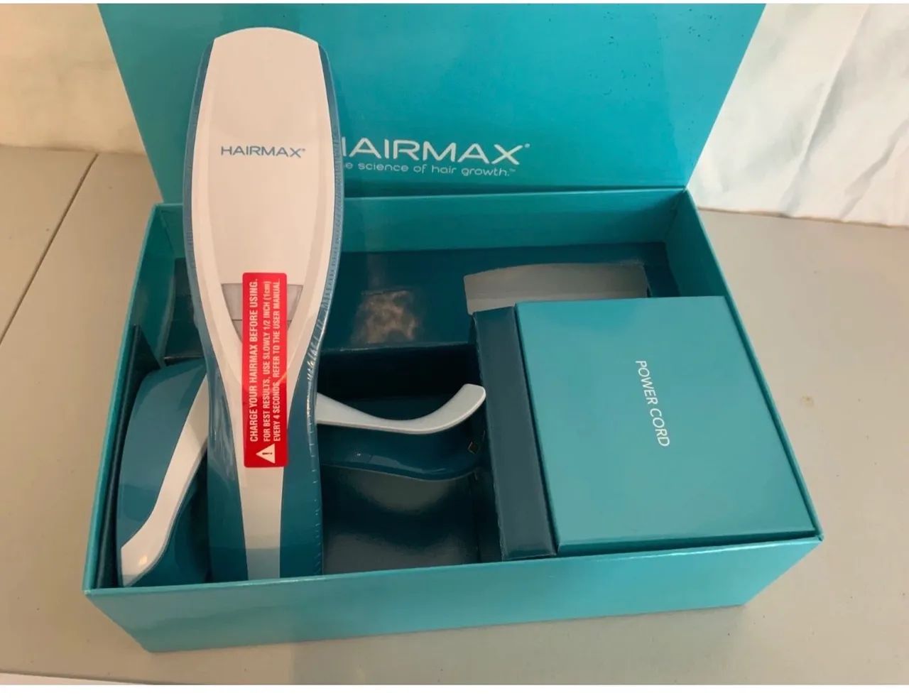 Escova hairmax laser nova para queda de cabelo  - Foto 4