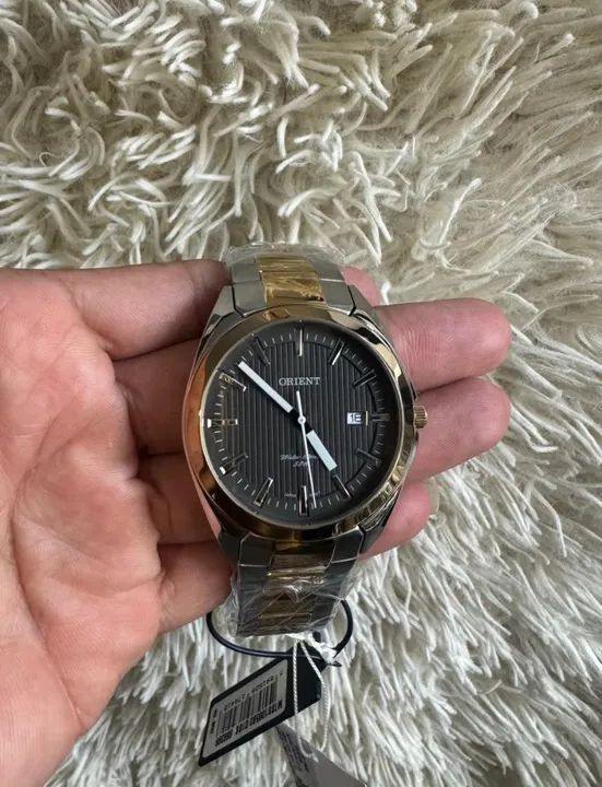 Orient prata com dourado- original, prova dágua e com garantia da autorizada 