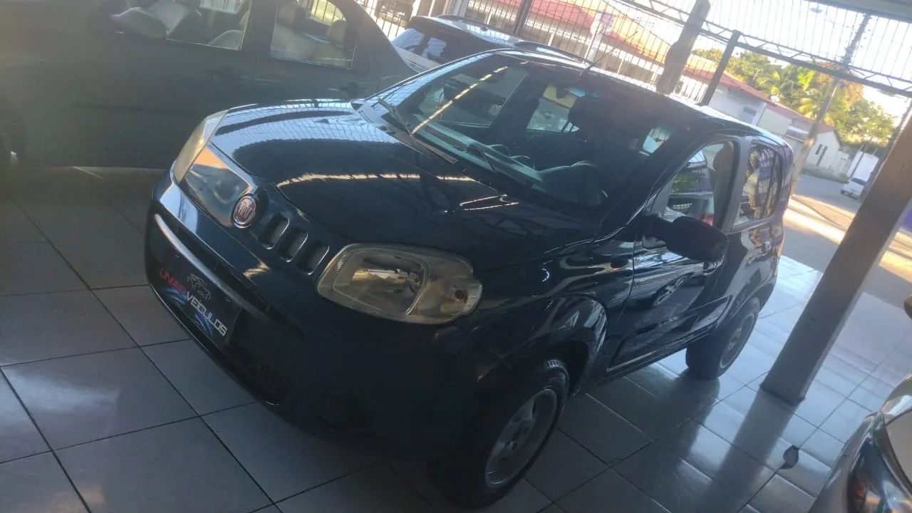 Fiat Uno Carro Extra  - Foto 4