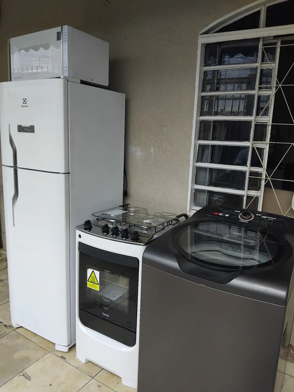 Geladeira fogão máquina micro-ondas entrego 