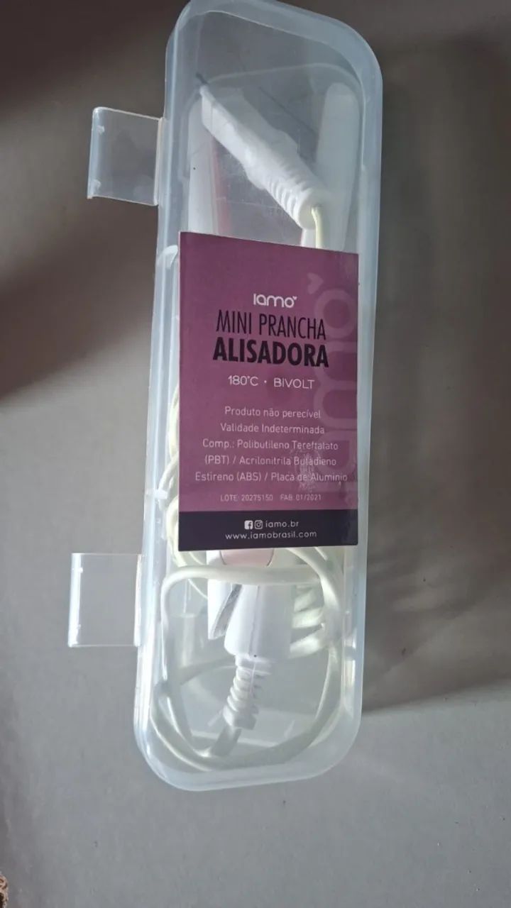 Mini prancha alisadora (ideal pra viagem). Bivolt. Usada uma vez. (Não é minha tá, é da mi