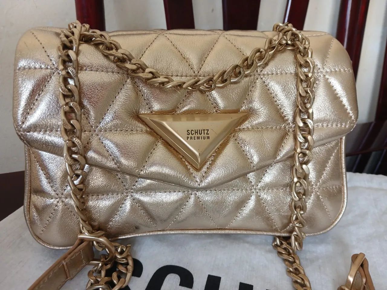 Bolsa dourada 944 schutz  - Foto 3