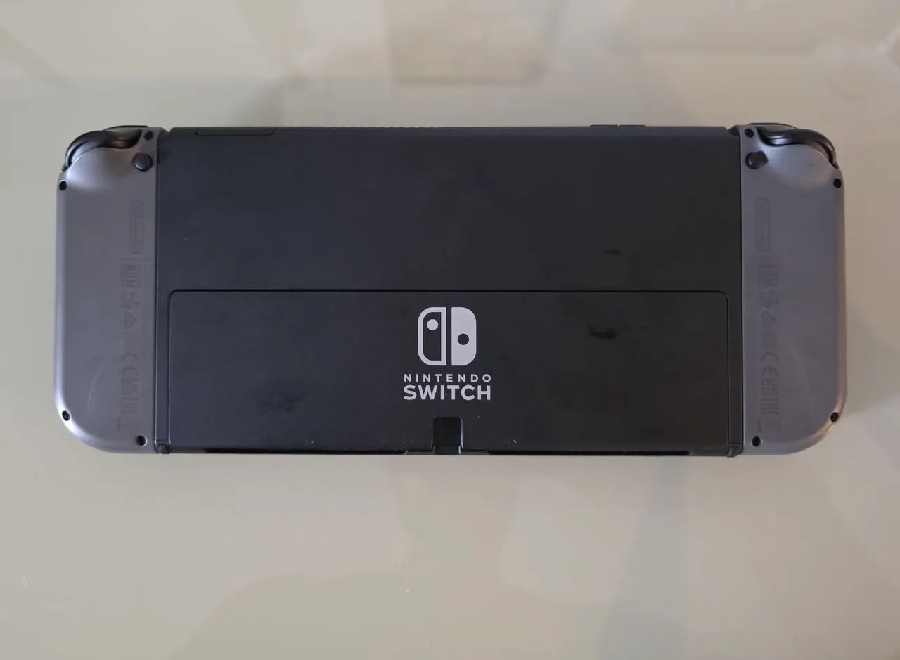Vendo Nintendo Switch V2 Oled com microsd 512gb e controle pro - Foto 5