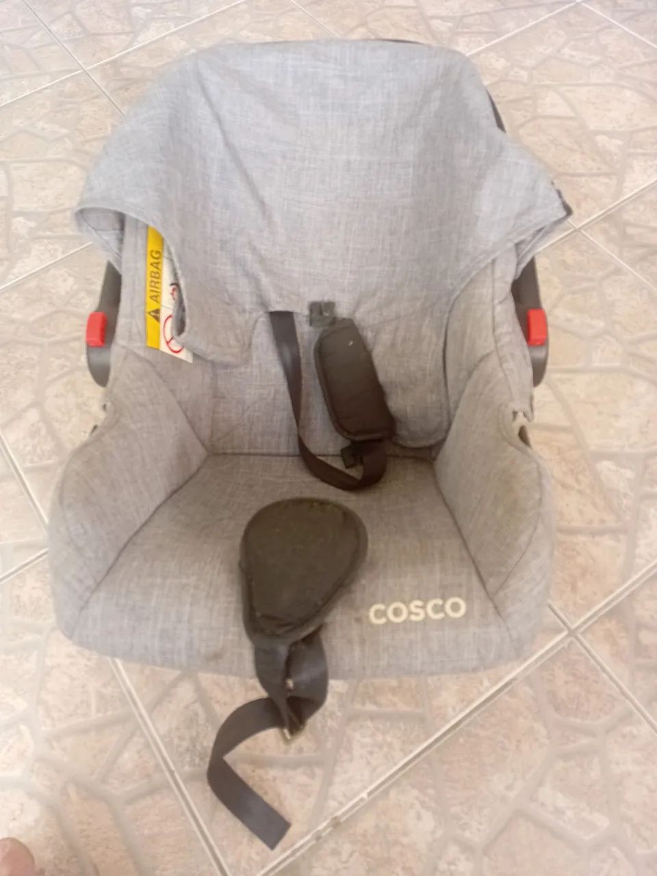 Bebê conforto. 