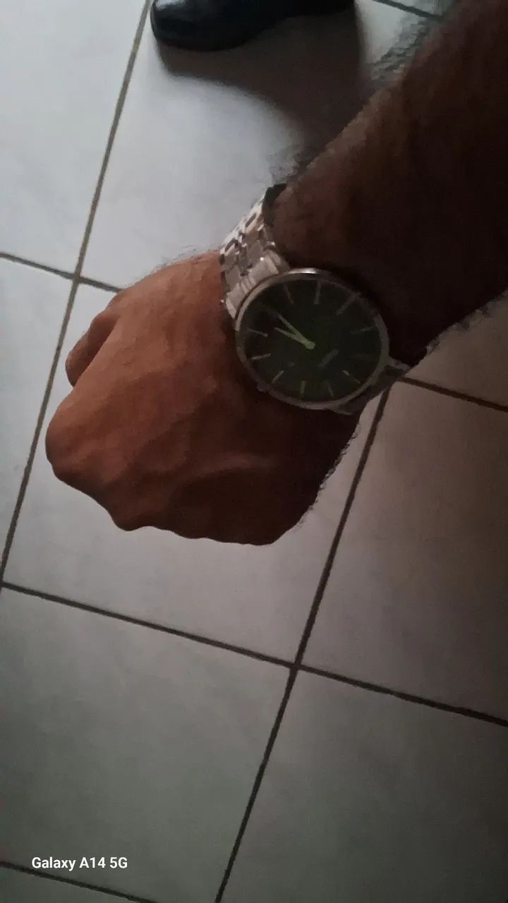 Vendo relogio orient em perfeito estado na caixa ? 