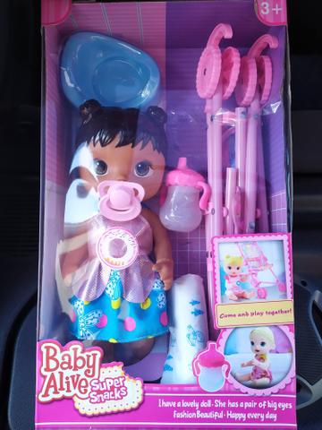 Boneca Baby Alive com carrinho - Foto 5
