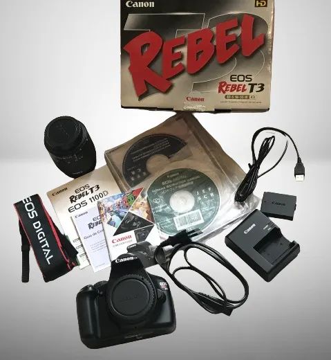 Vendo câmera digital cânon oes rebel T3. semi nova