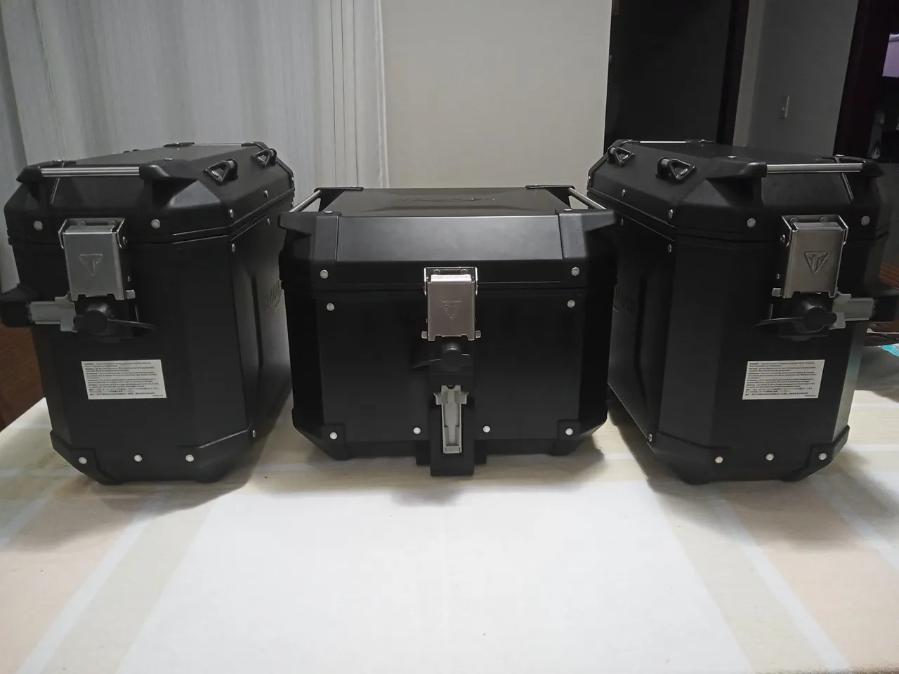 Baús laterais e top case Triumph Tiger Originais