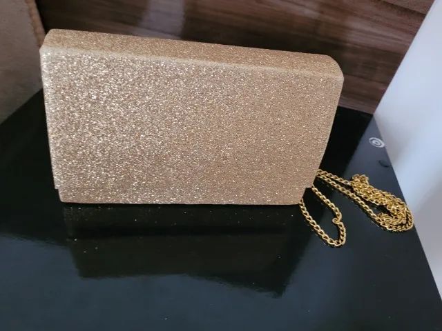 Bolsa de festa dourada