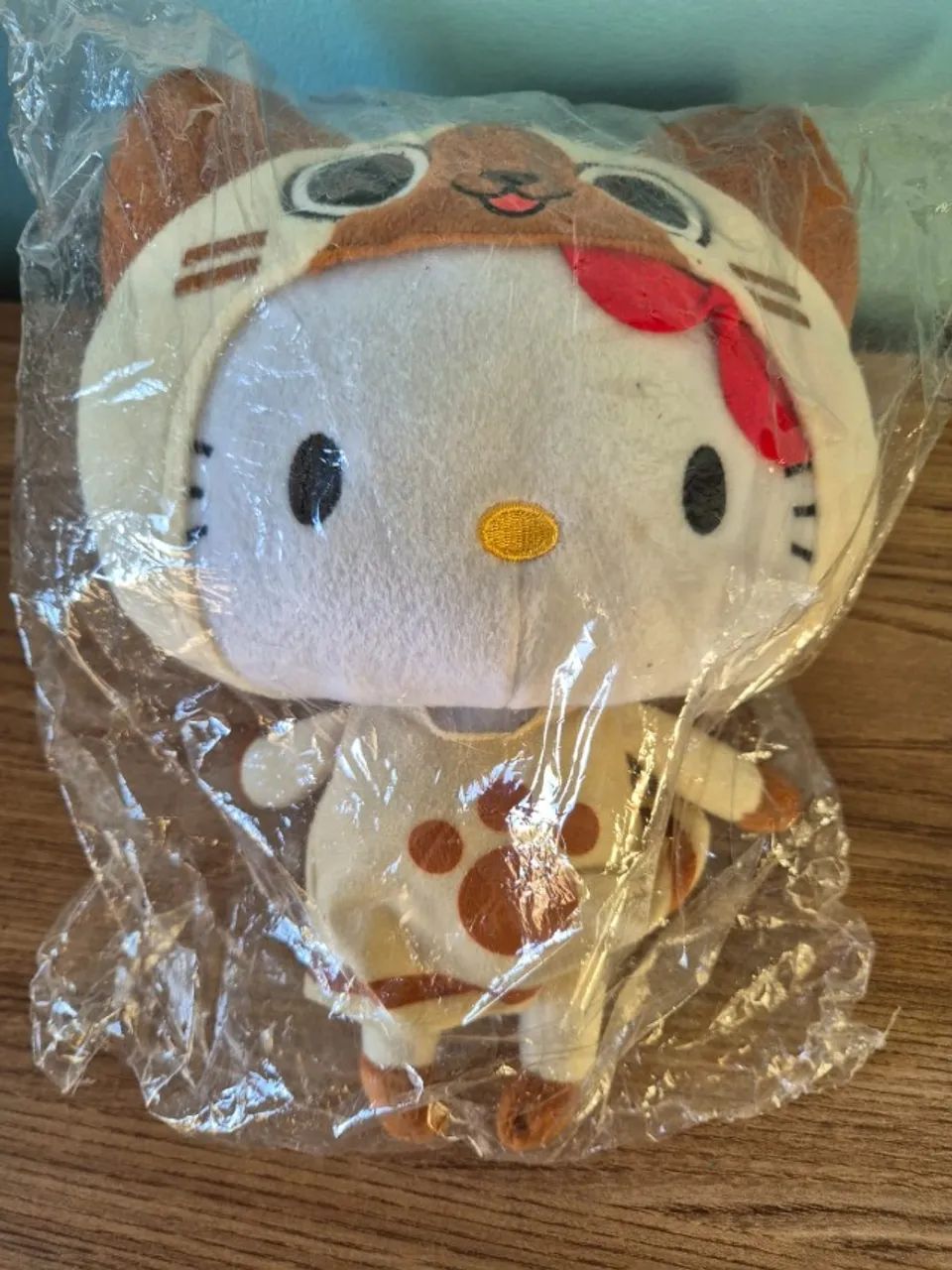 Pelúcia Banpresto Monster Hunter Airou Sanrio Hello Kitty