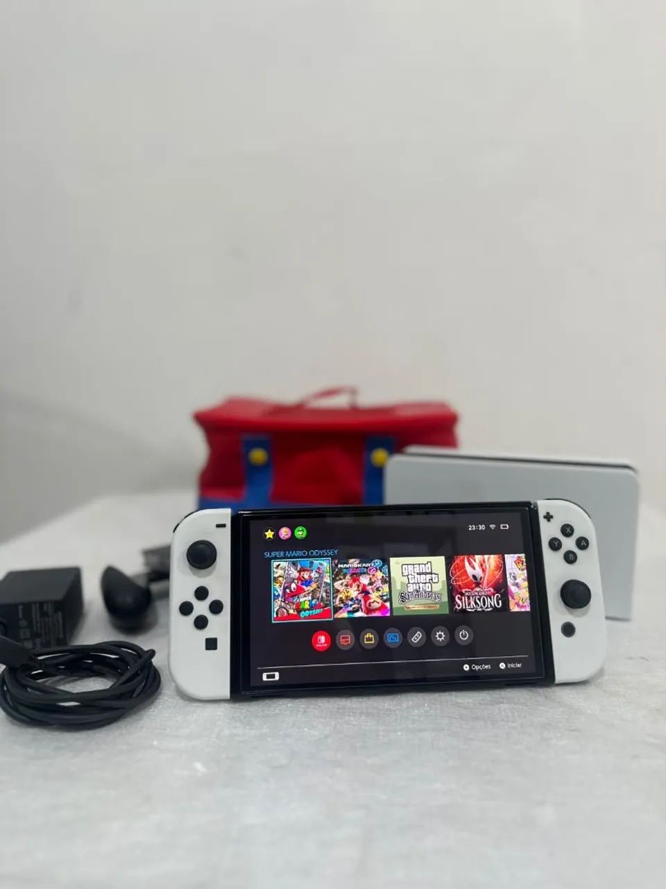 NINTENDO SWITCH OLED 64GB + 256 EXTRA 