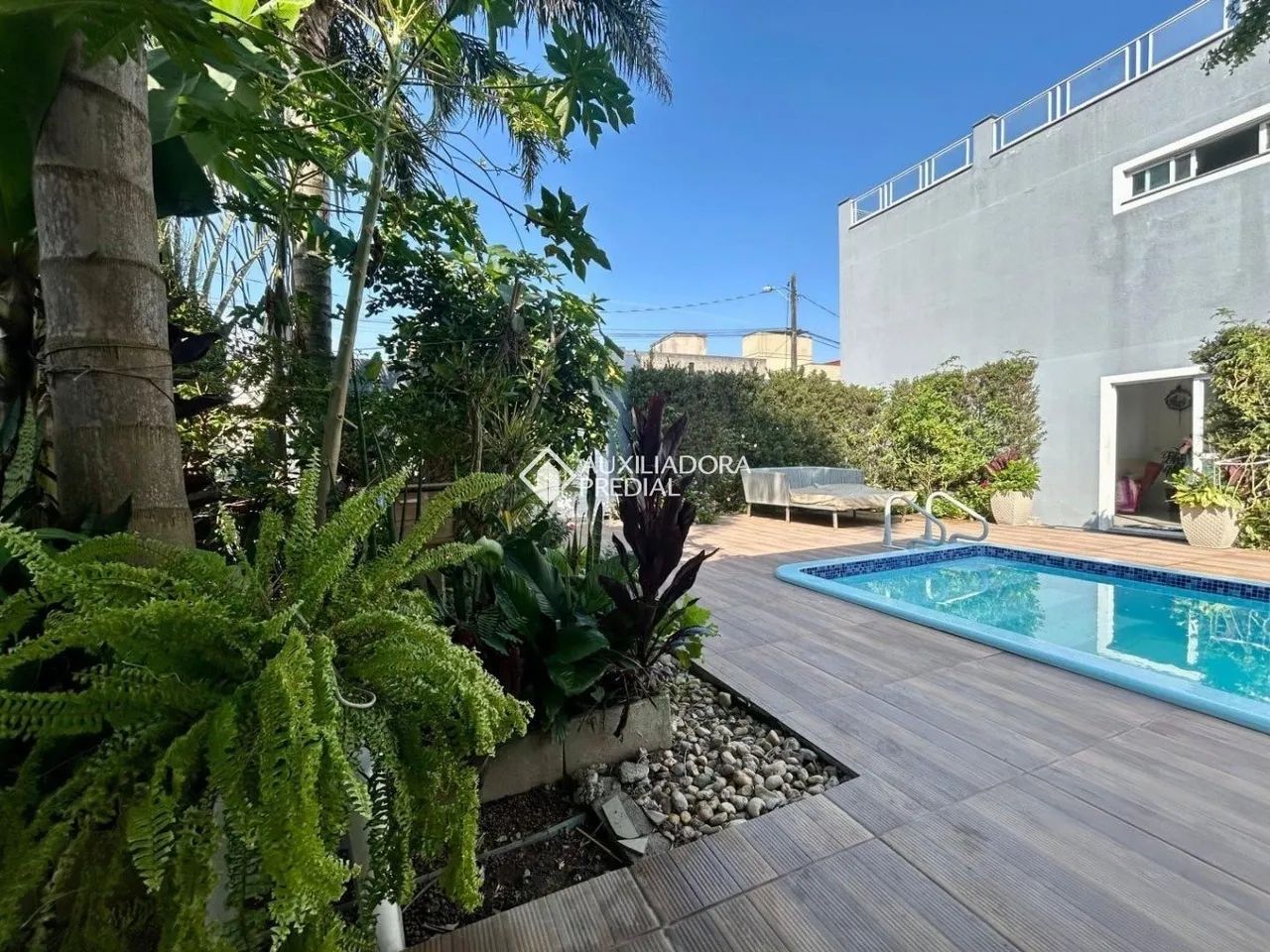 Casa excepcional em Cacupé com piscina, amplo terraço e vista para o mar - Foto 4