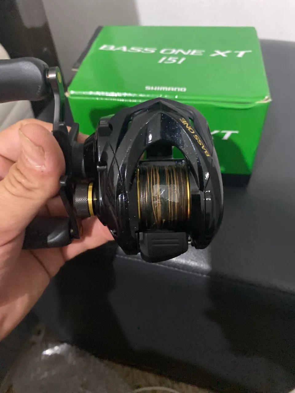 Carretilha de pesca shimano bass one xt 151 - Esportes Aquáticos