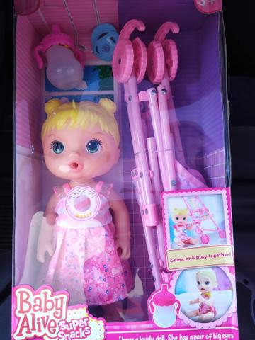 Boneca Baby Alive com carrinho - Foto 2