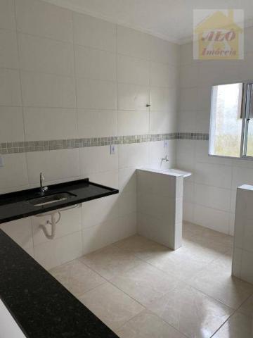 Casa com 2 dormitórios à venda, 50 m² por R$ 144.900 - Maracanã - Praia Grande/SP - Foto 8