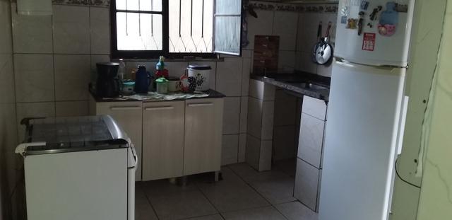 Vendo casa 2 quartos grande + kitinete de laje + terraço - Foto 6