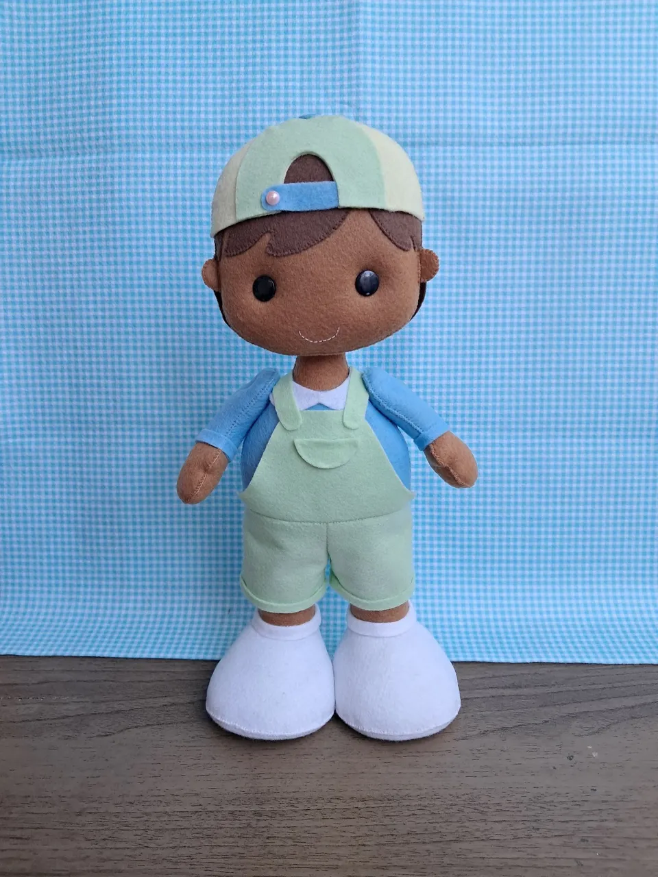 Boneco de feltro infantil