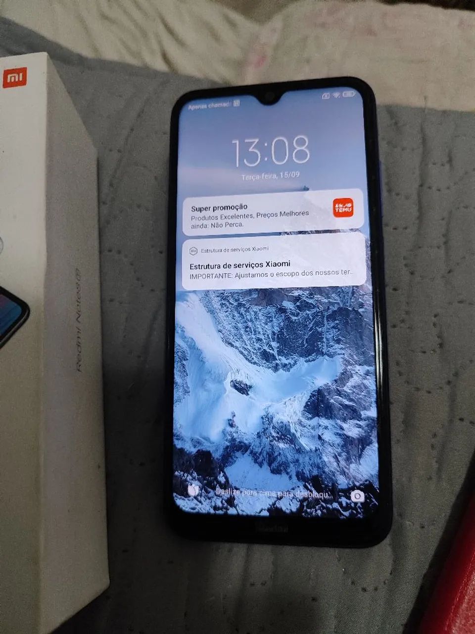 Redimi note 8 com caixa e 2 capinhas carteira.