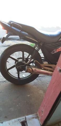 Vendo ou troco por descarga original Titan 150