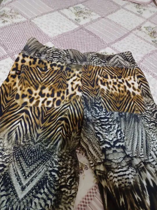 Calça Flare Animal Print núm. 40  marca Canellado - Foto 3
