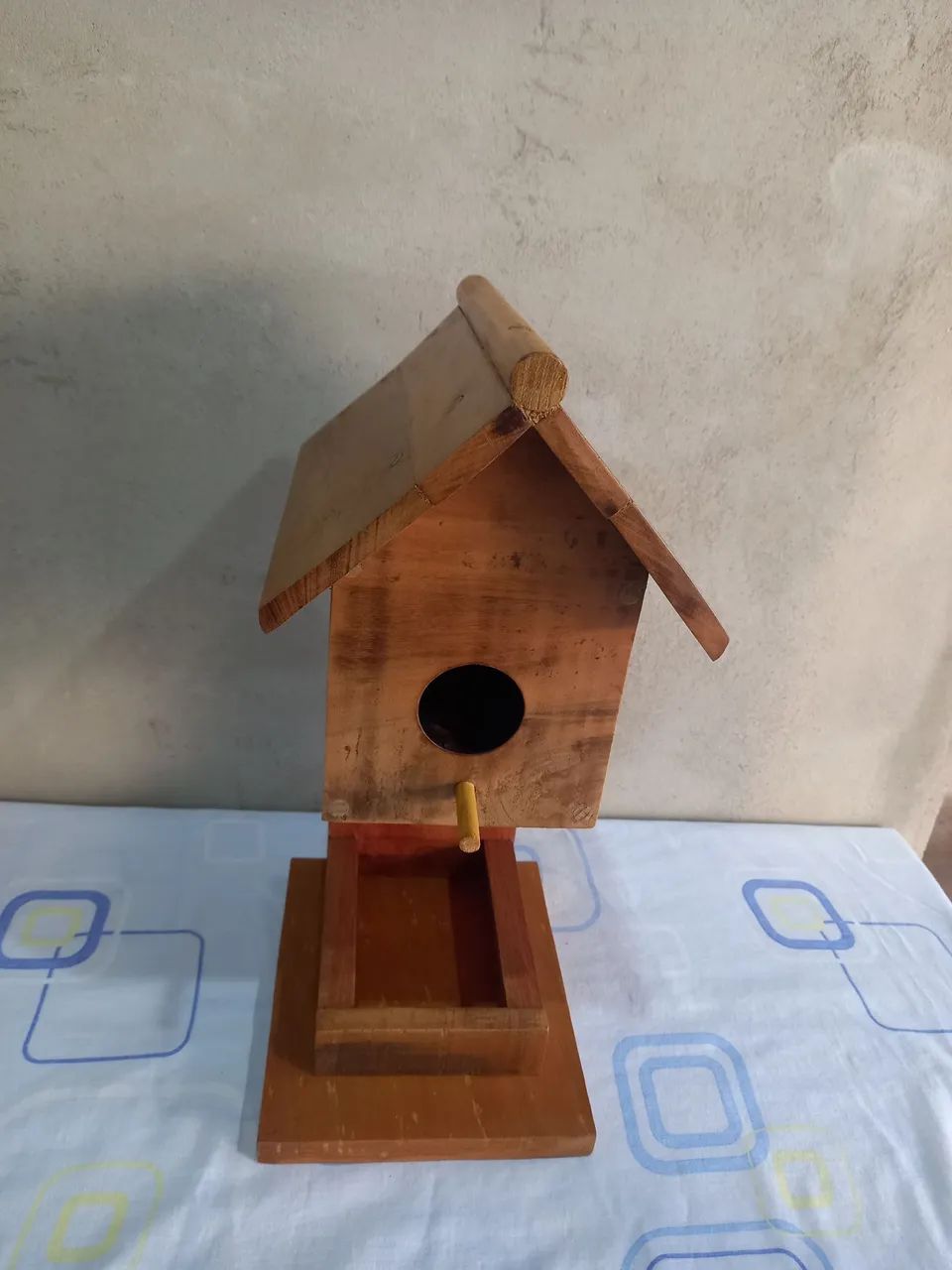 Casa comedouro para pássaro 