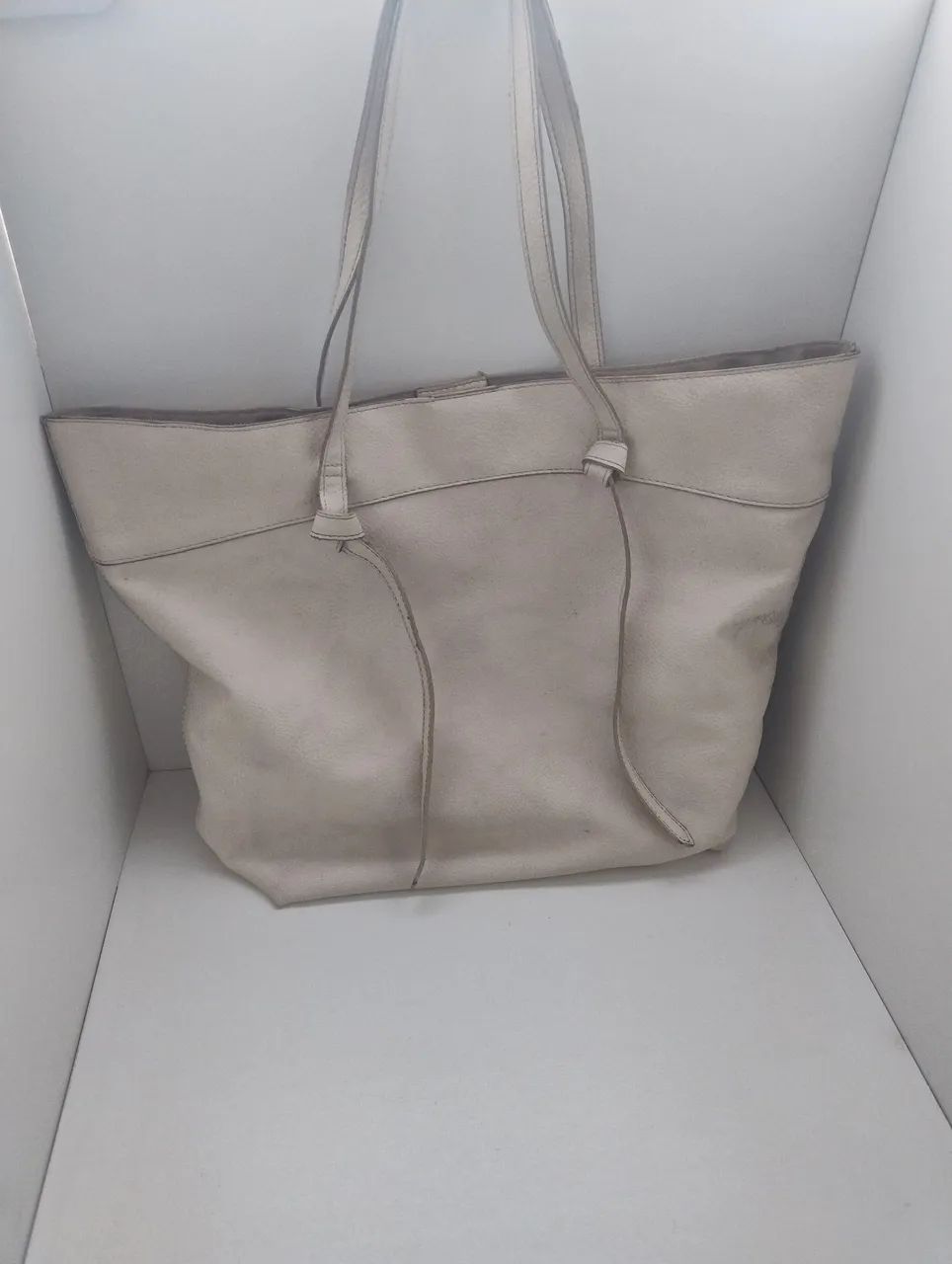 Bolsa em couro offwhite para reparo 