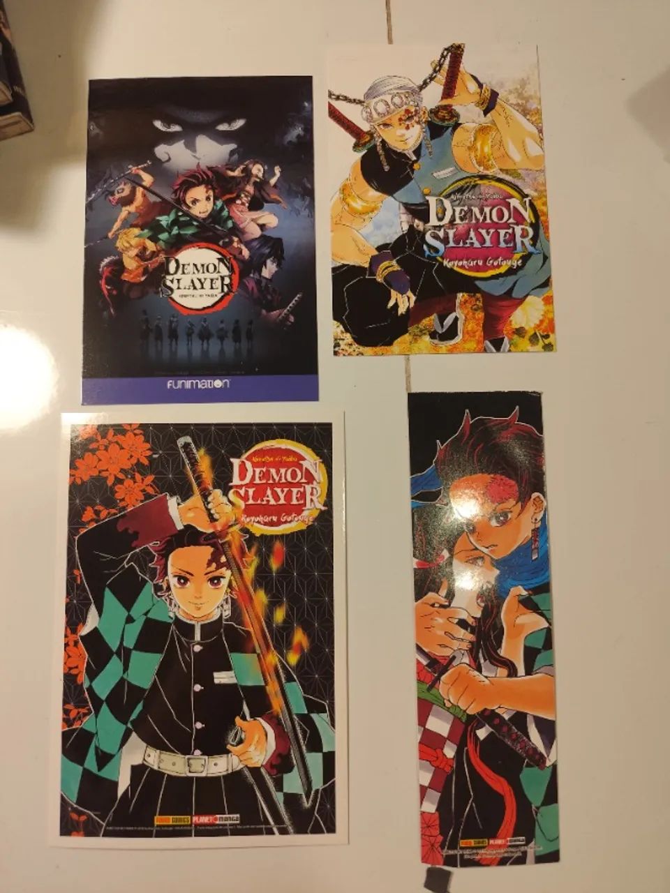 Coleção completa demon Slayer com brindes - Foto 2