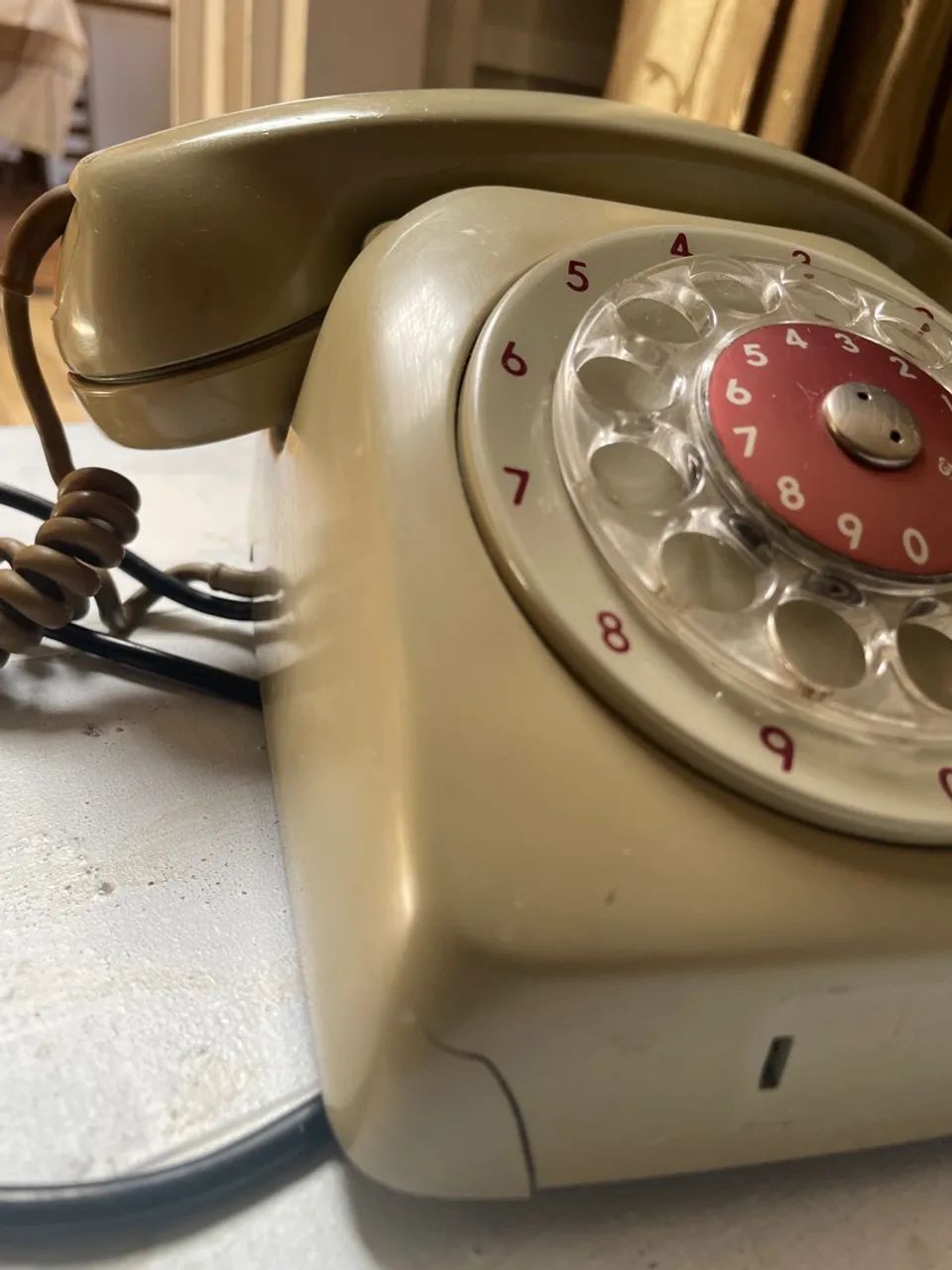 Telefone antigo de disco Ericsson bege