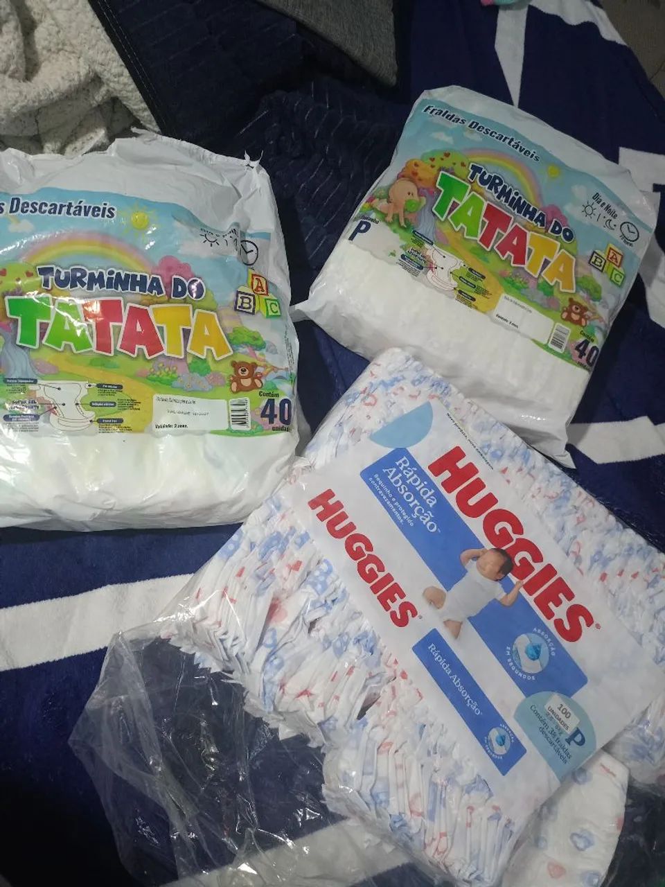 Vendo ou troco 3 pacotes de fralda, troco por tamanho maior M-G-GG 