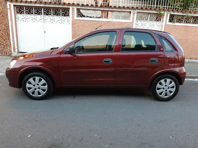Corsa 2011 hatch 1.4 flex com gnv único dono - Foto 6