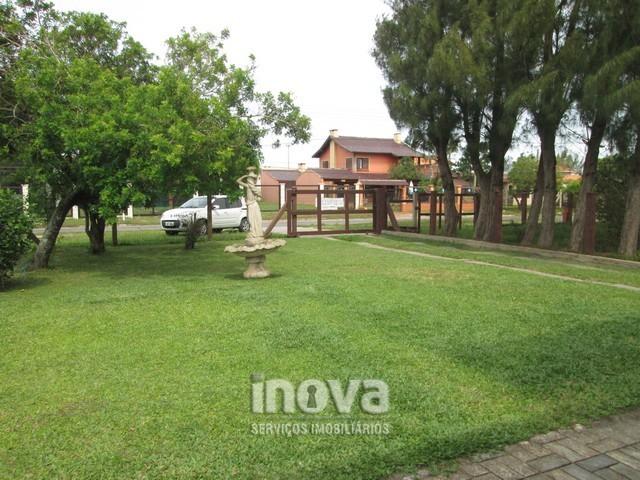 Casa de 04 dormitórios no centro de Imbé - Foto 5