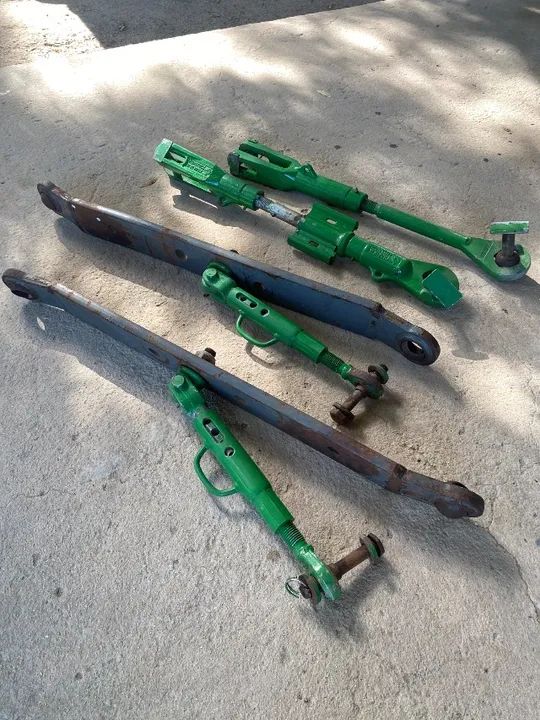 Conjunto braços hidráulico trator