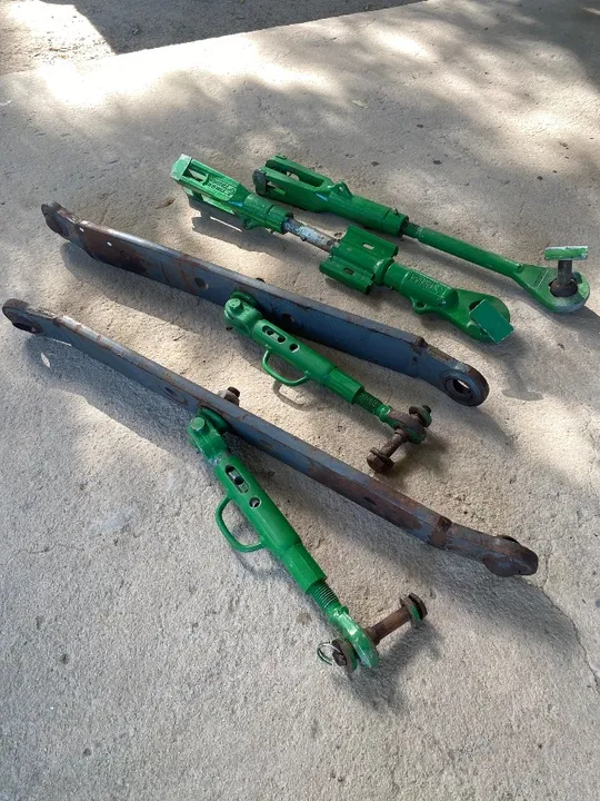 Conjunto braços hidráulico trator