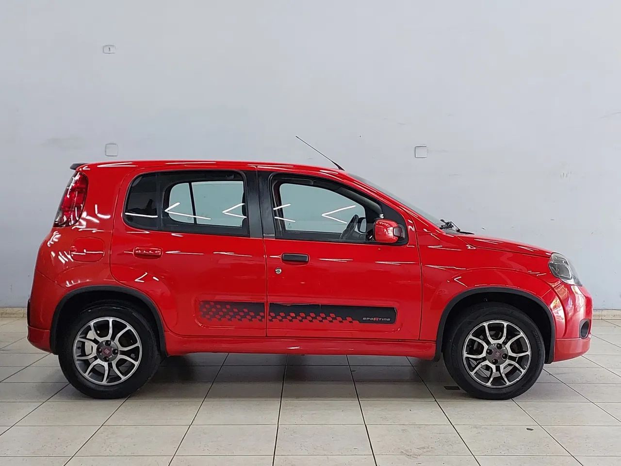 Fiat Uno Sporting 1.4 EVO Fire Flex 8V 4P 2013 - Foto 5