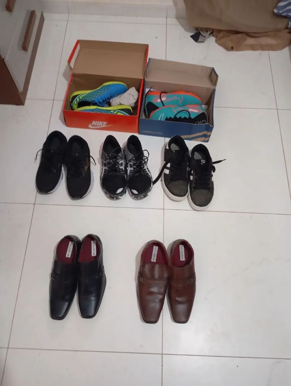 Roupas e sapato e tênis e chuteira - Foto 2