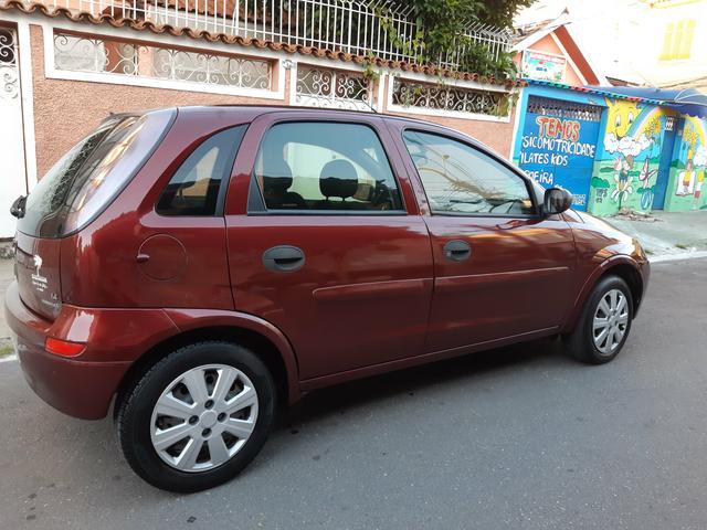 Corsa 2011 hatch 1.4 flex com gnv único dono - Foto 9