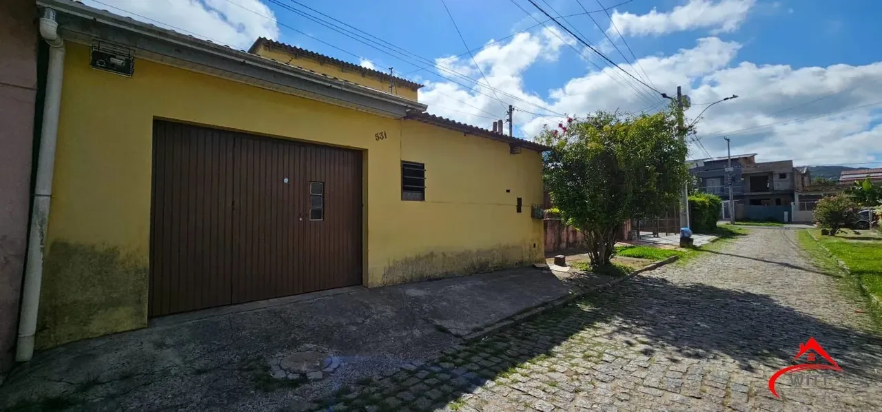 Casa no bairro Restinga - 3 dormitórios