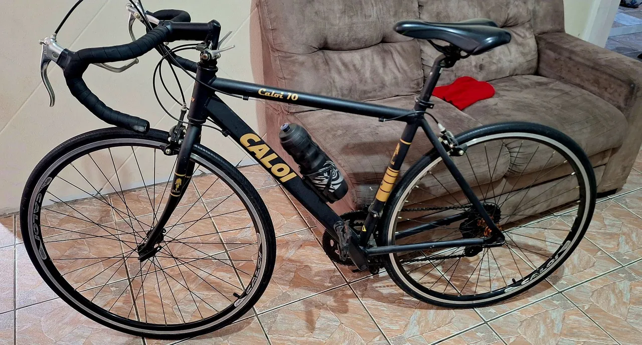 Bicicleta mais rolo de treino 