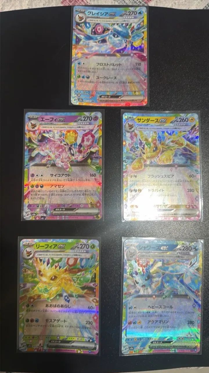5 cartas Pokémon evoluções prismáticas.