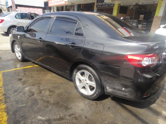 Toyota Corolla Financio ate sem entrada+gnv d quint ger+ completo troca moto ou carro - Foto 17