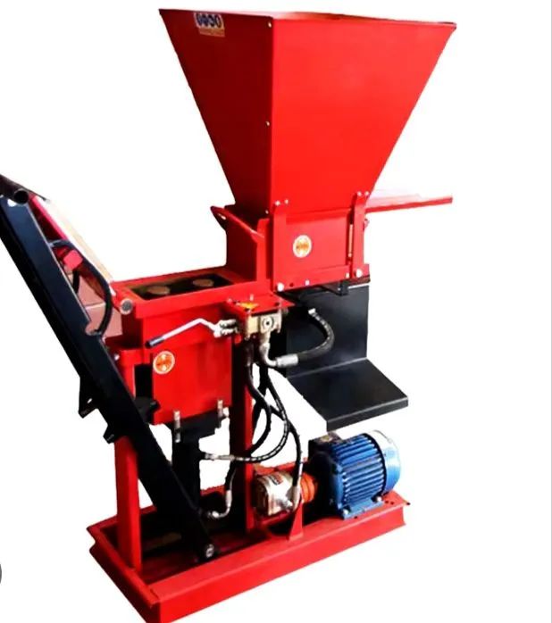 Vendo ou troco em carro em dia Tijolos ecológicos Máquina Nova funcionando bem.