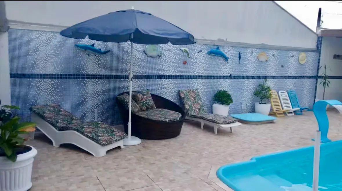 Casa com piscina em Caiobá
