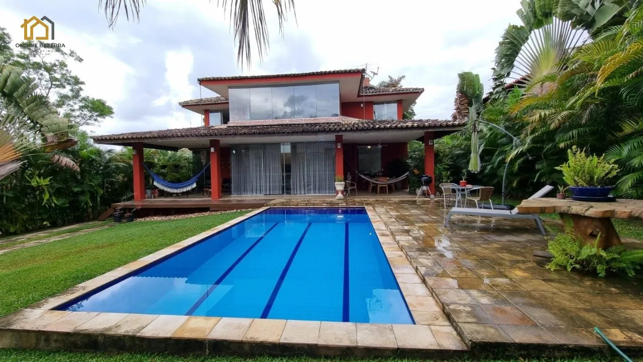 Vendo casa no Condomínio Vila Bela, km 8, com piscina privativa, 3 suítes e jardim lindo